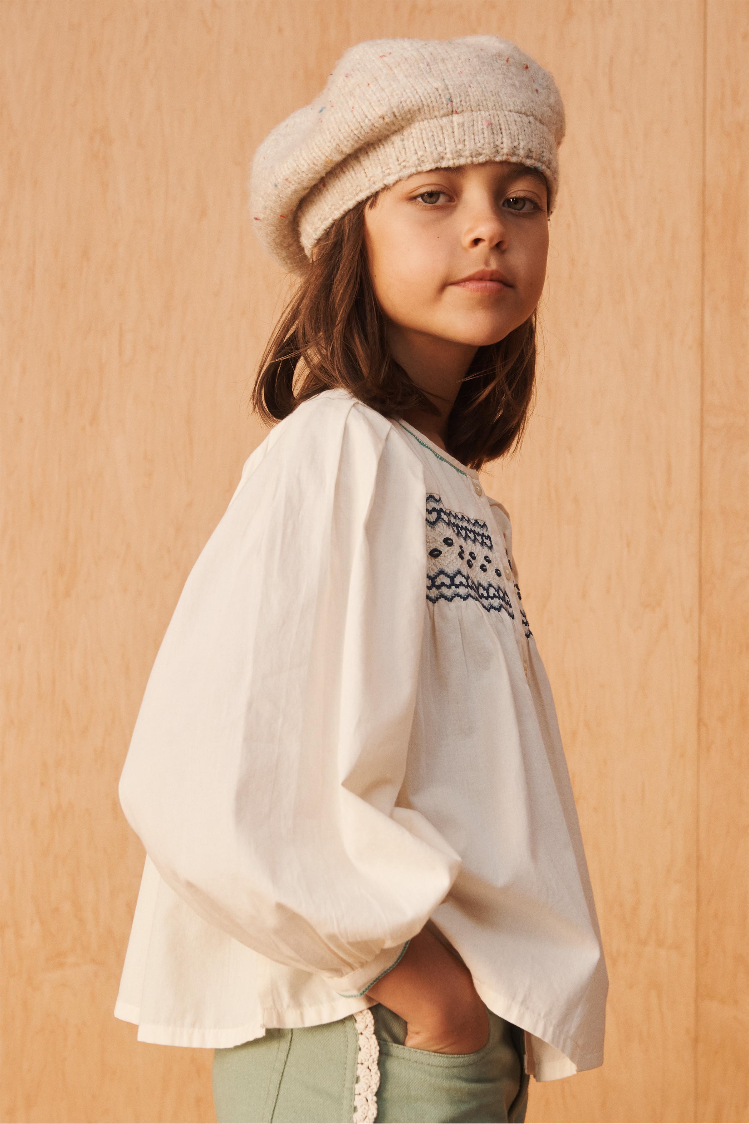 LIMITED EDITION SMOCKED BLOUSE