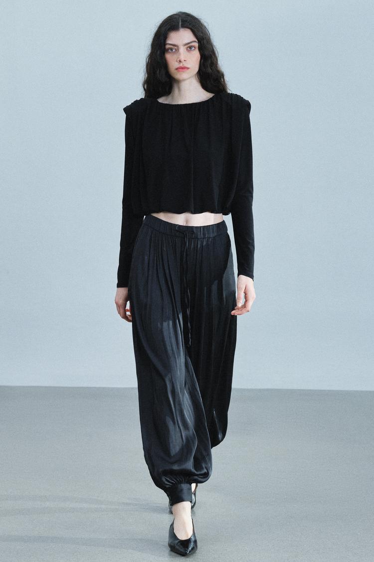 DRAPED TOP WITH SHOULDER PADS
