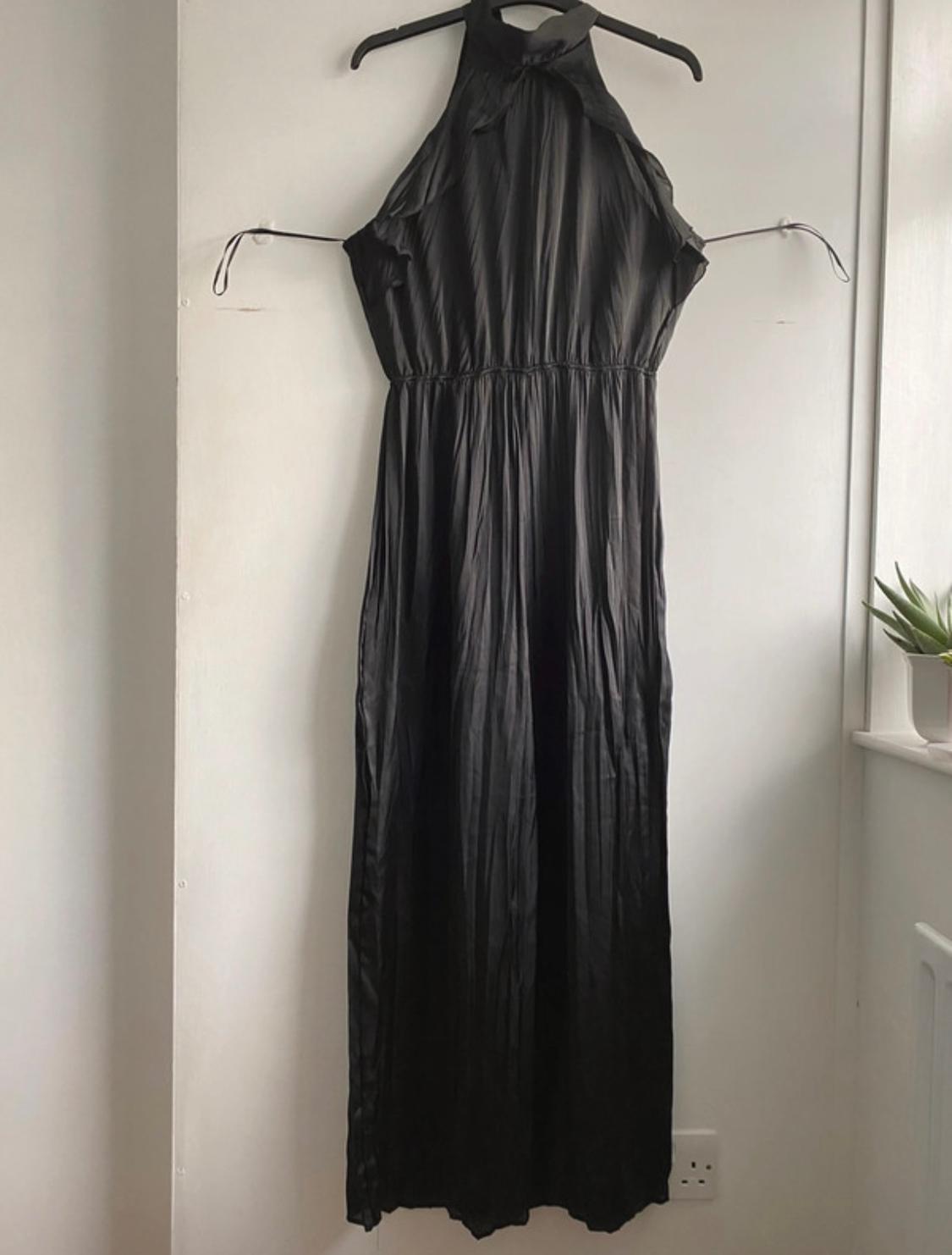 RUFFLED HALTER NECK JUMPSUIT