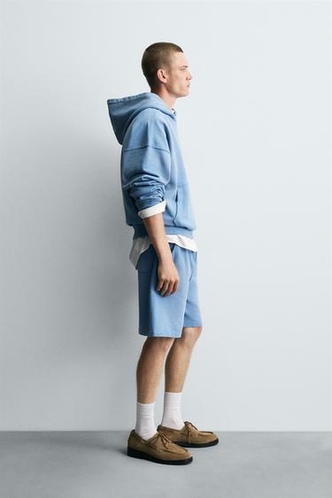 BERMUDES RENTAT SPRAY - Blau clar de Zara