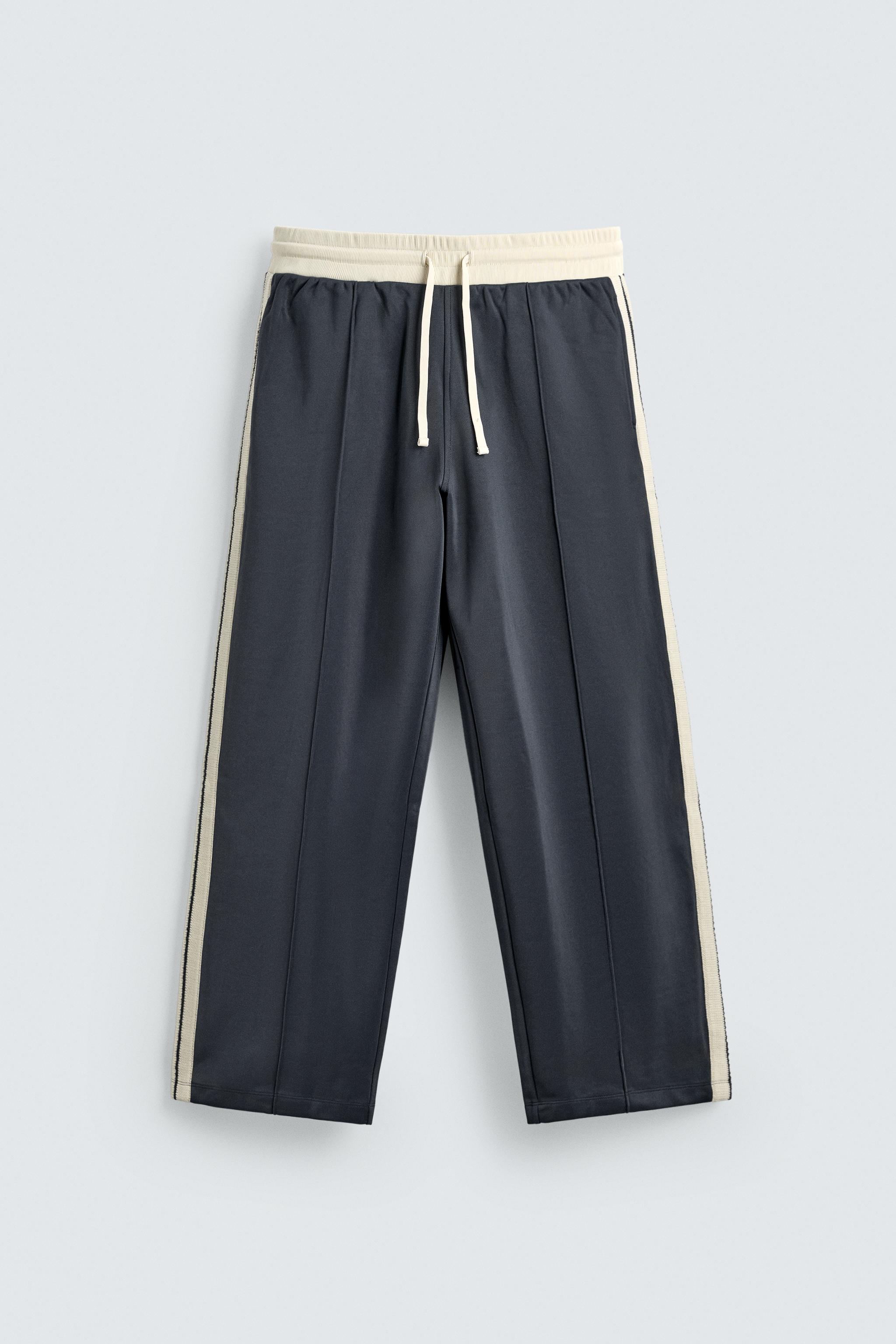 WIDE FIT JOGGER PANTS WITH STRIPES