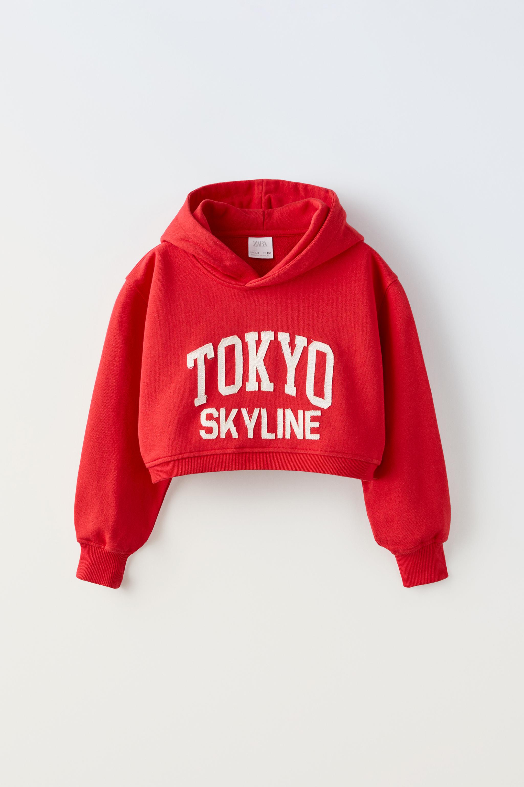 CROPPED HOODIE WITH EMBROIDERED SLOGAN