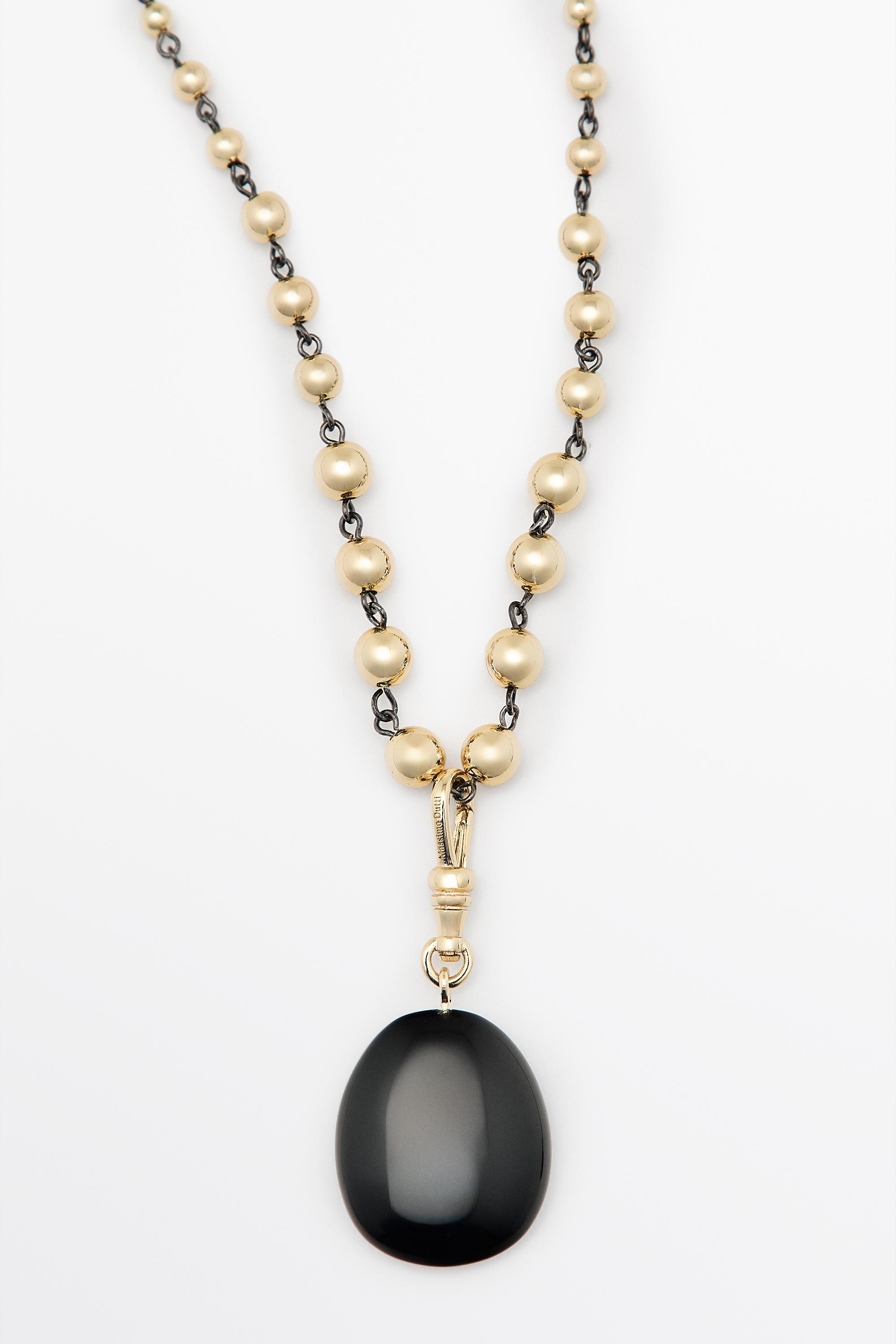 Collier chaîne à billes et onyx