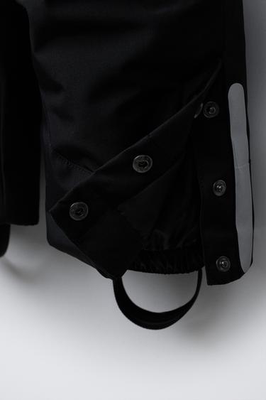 SALOPETTE LONGUE RÉSISTANTE À L'EAU ET AU VENT AVEC POCHES - Noir de Zara - Image 5