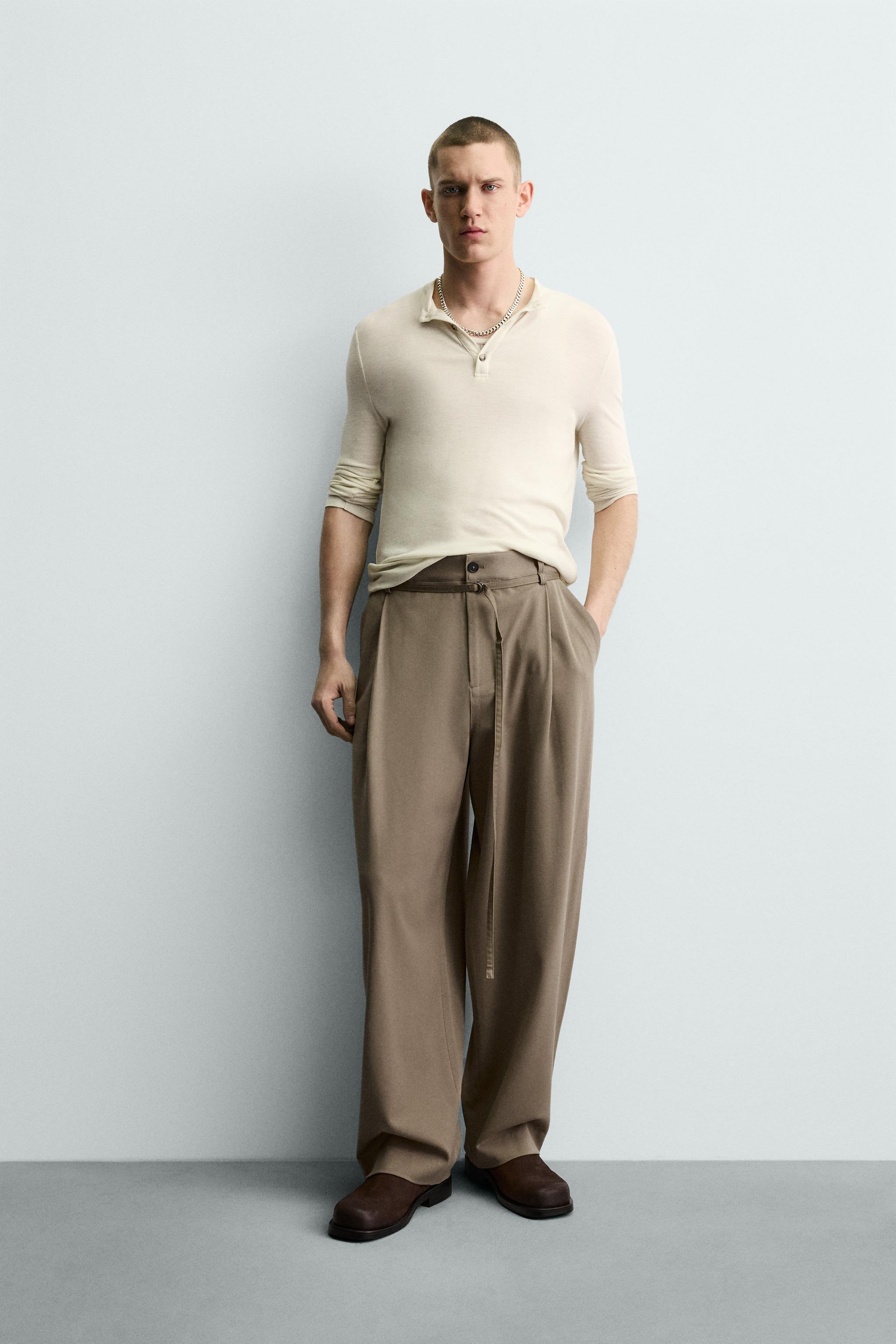BALLOON FIT PLEATED BELTED PANTS