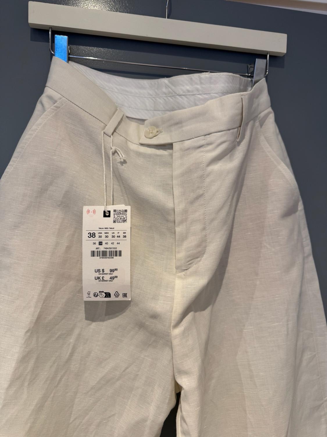 RELAXED FIT PLEATED TROUSERS - Image 2
