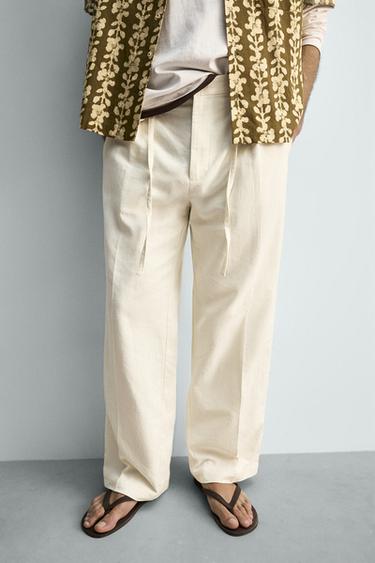 PANTALON À PLIS EN COTON ET LIN - Écru de Zara - Image 4