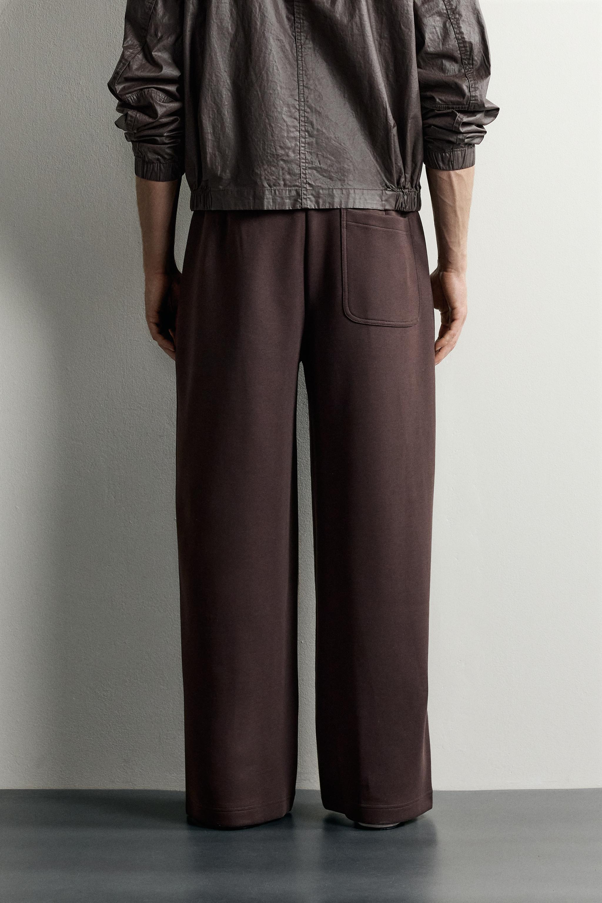 PLEATED BALLOON-FIT PANTS