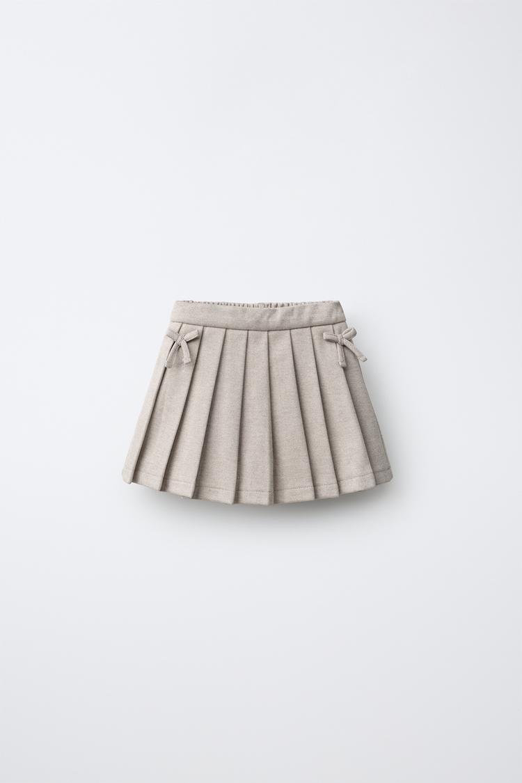STRUCTURED PLEATED BOW BERMUDA SKIRT — Brown / Taupe