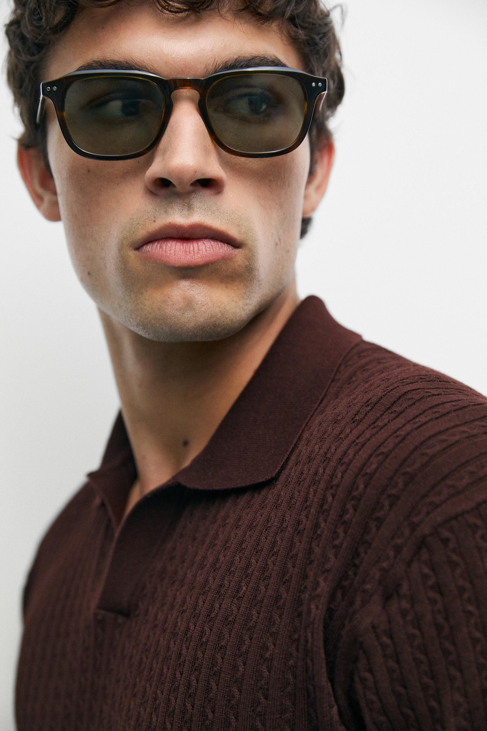 100% cotton cable-knit polo sweater
