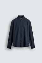 Front view of a long-sleeved black shirt with a button-down collar and a chest pocket.