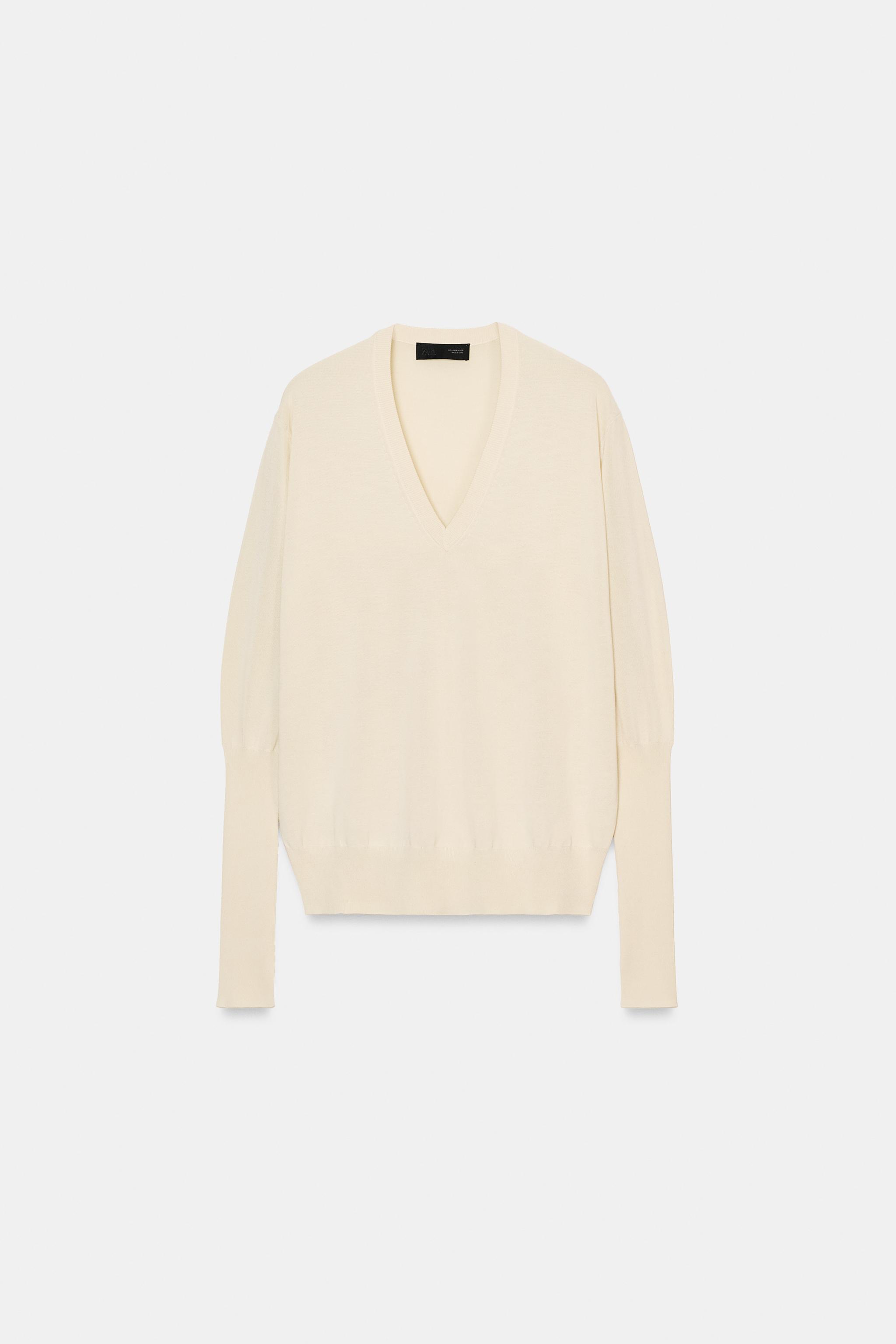 PULL EN MAILLES EXTRAFINES À COL V