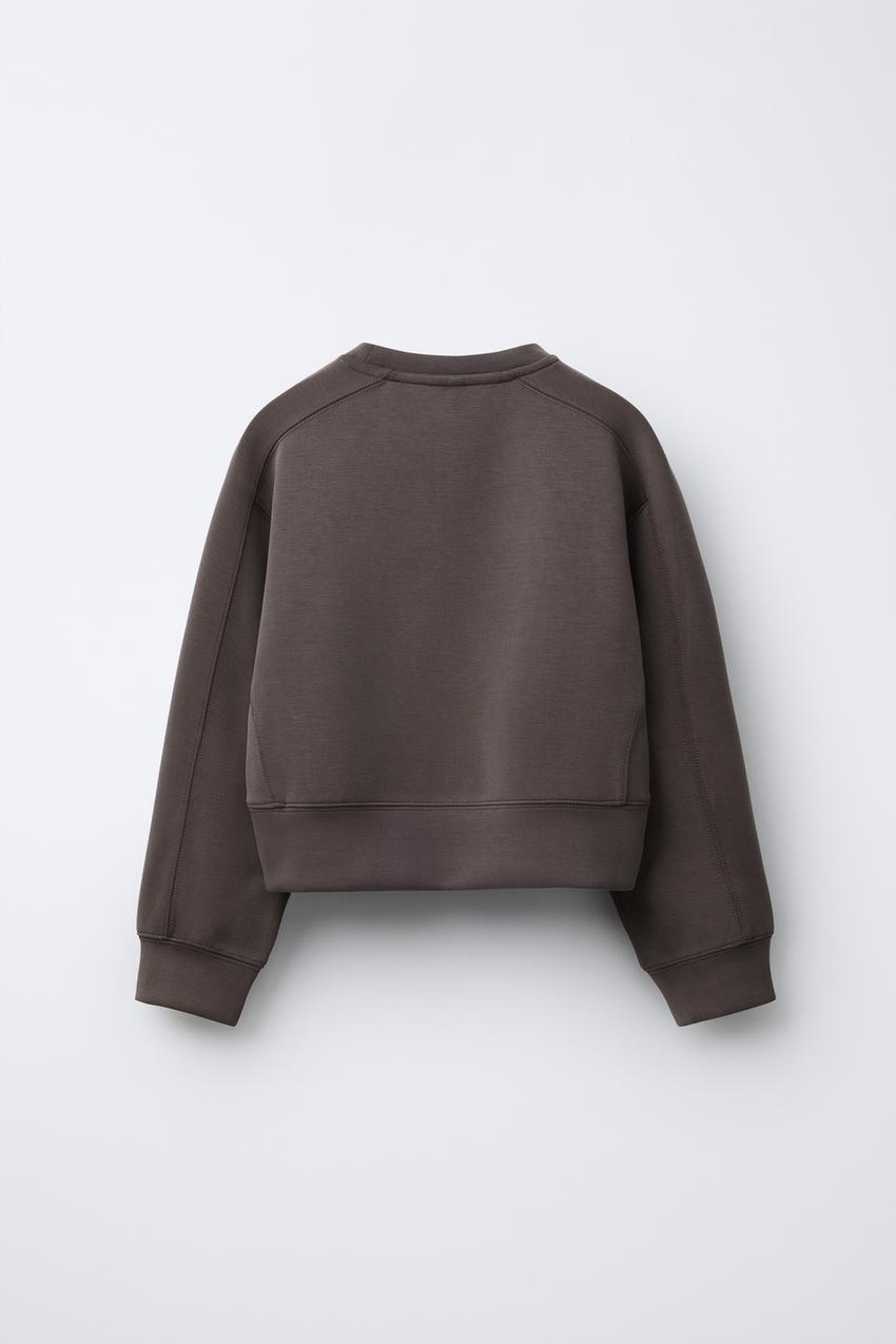 SPORTY SWEATSHIRT WITH RAISED SLOGAN