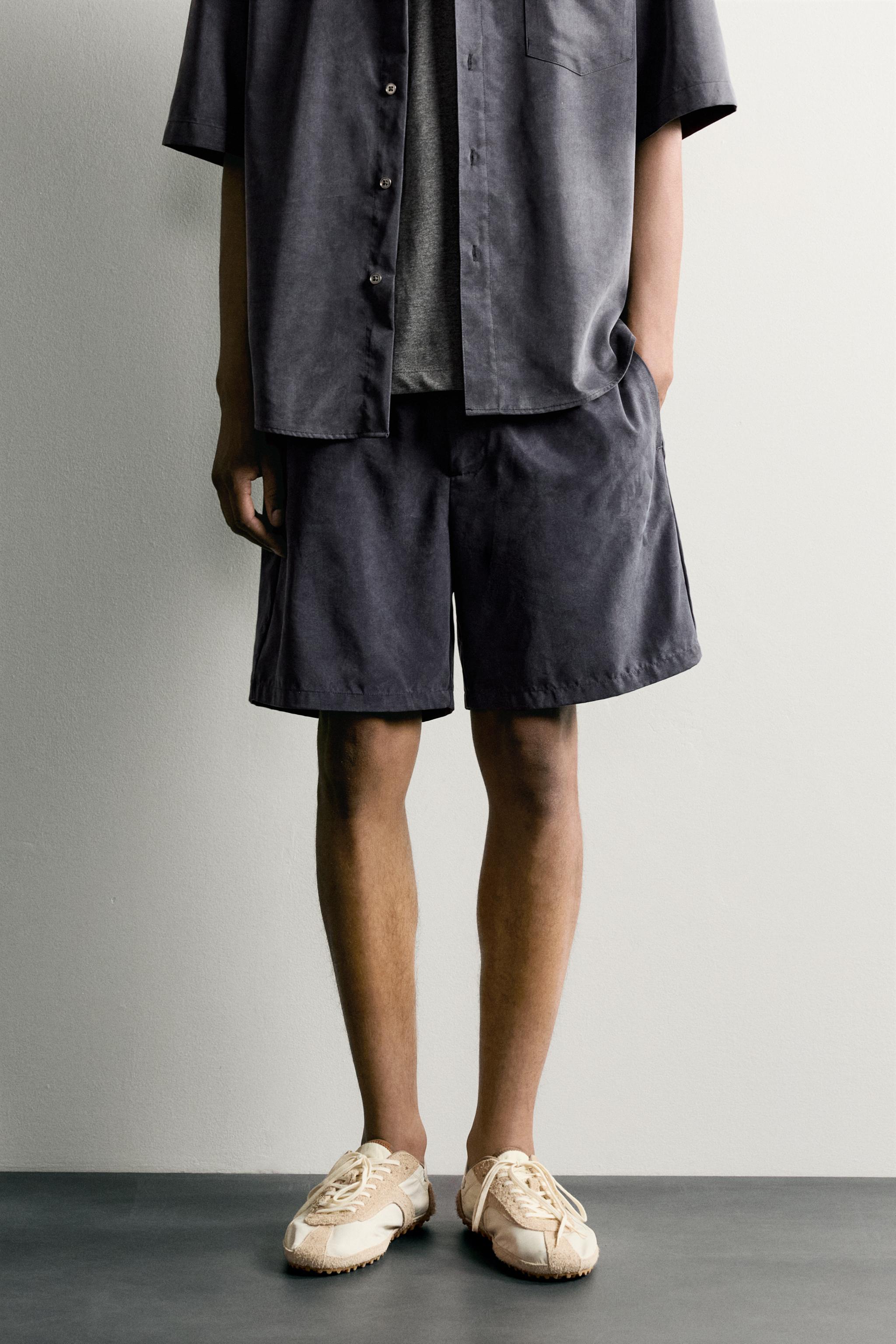 RELAXED FIT FLOWY SHORTS — Navy blue