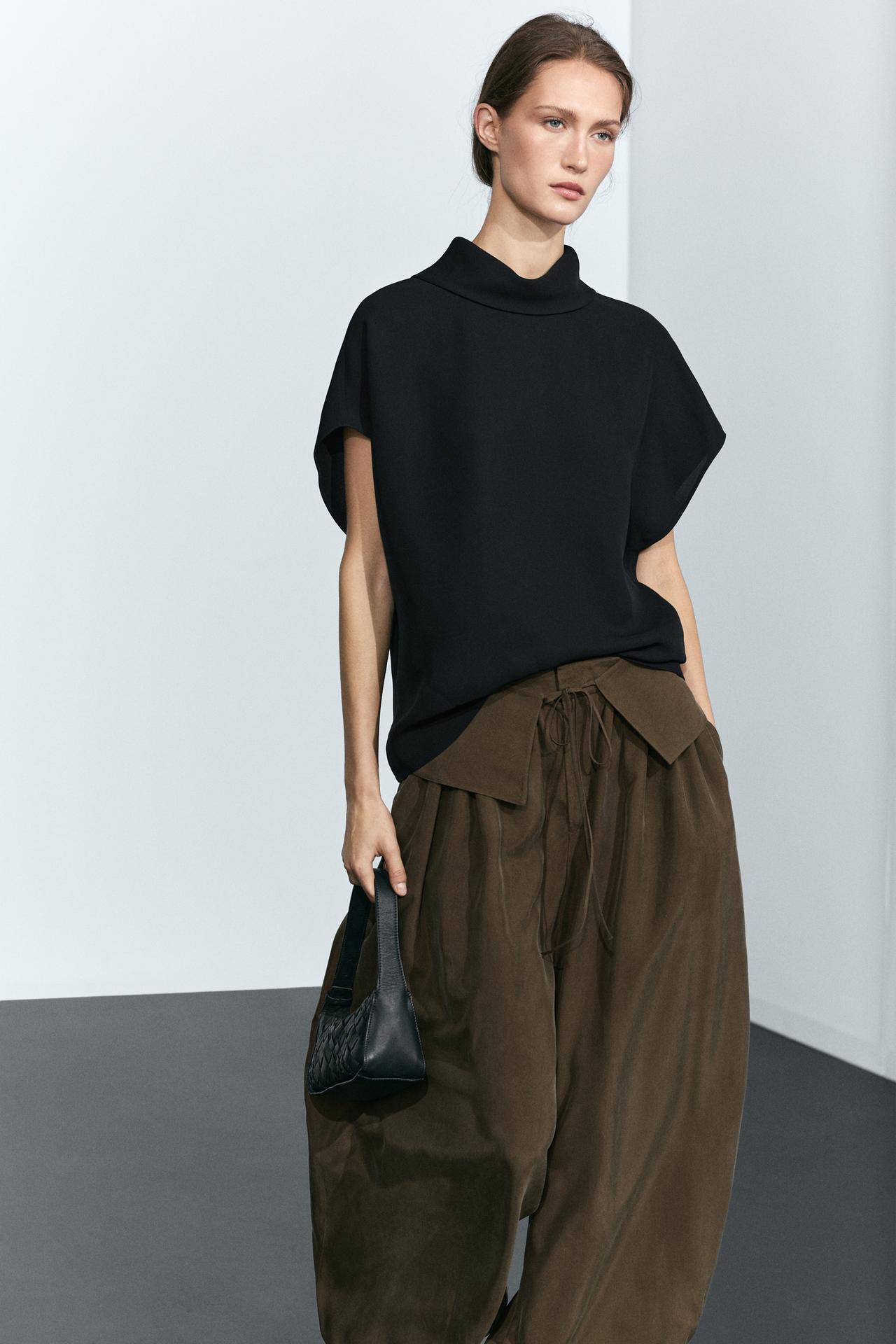 Sleeveless roll neck top — Black