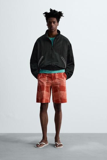 BAÑADOR LARGO ESTAMPADO © OTIS KWAME KYE QUAICOE - Naranja de Zara - Imagen 0