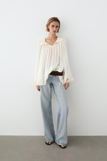 Blusa fluida detalle bordados - Crudo de Zara