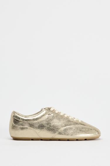 METALLIC TRAINERS - Gold by Zara