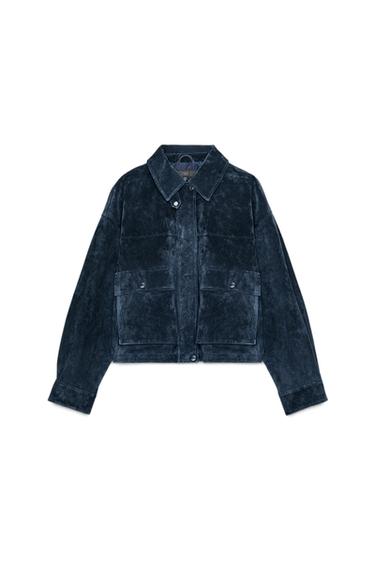 Front view of a navy blue bomber jacket with a lapel collar, front flap pockets, and a concealed zip fastening.