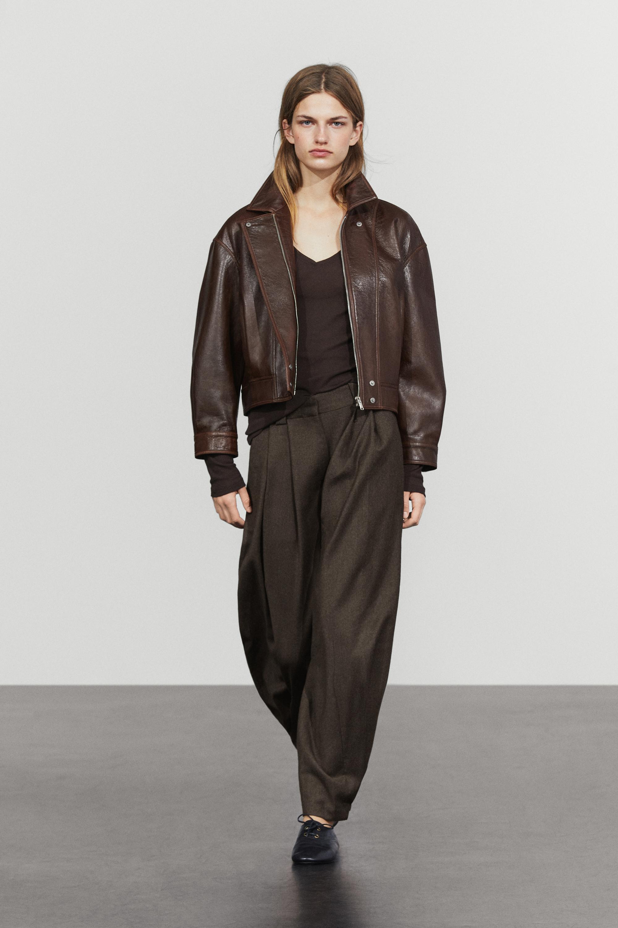 Pleated flannel trousers with hem detail