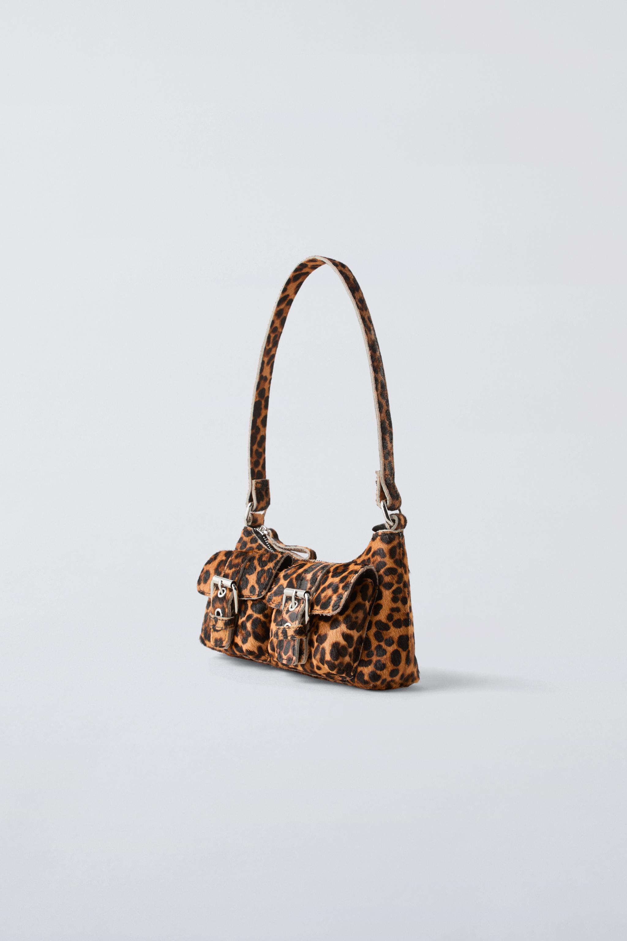 SCHULTERTASCHE AUS LEDER MIT ANIMAL PRINT