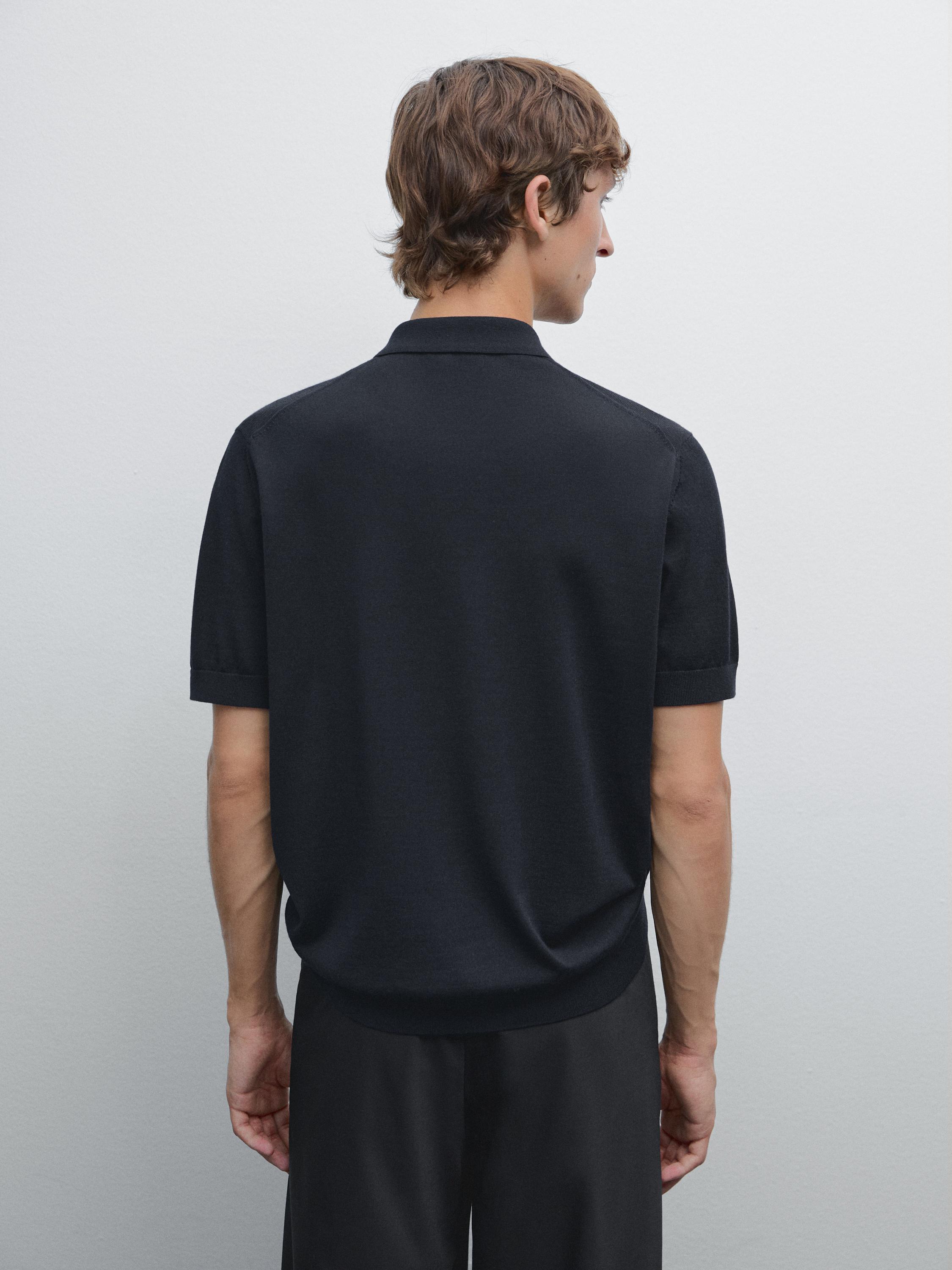 Polo en maille à col zippé