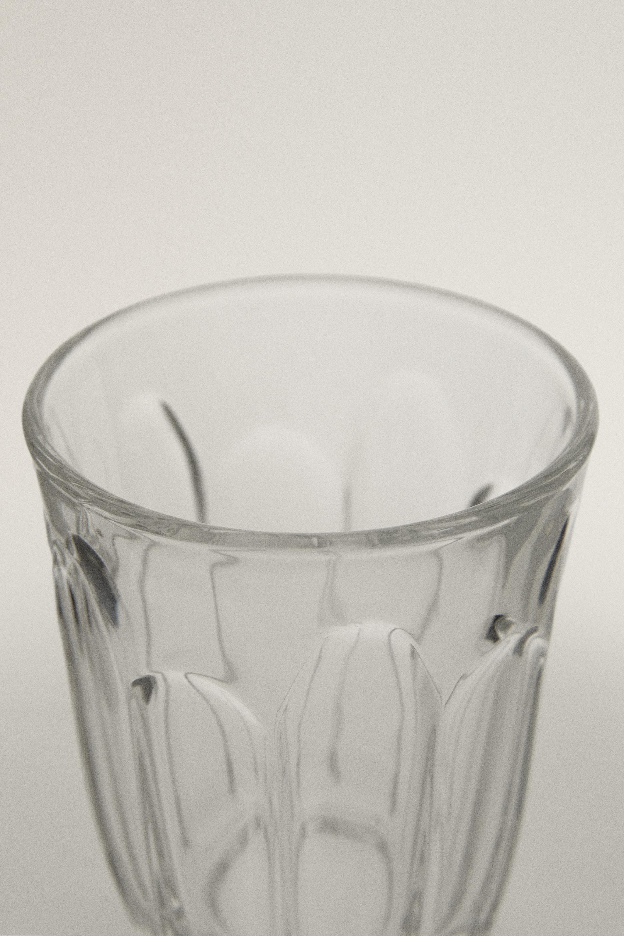 COFFEE TUMBLER WITH RAISED DESIGN — Transparent