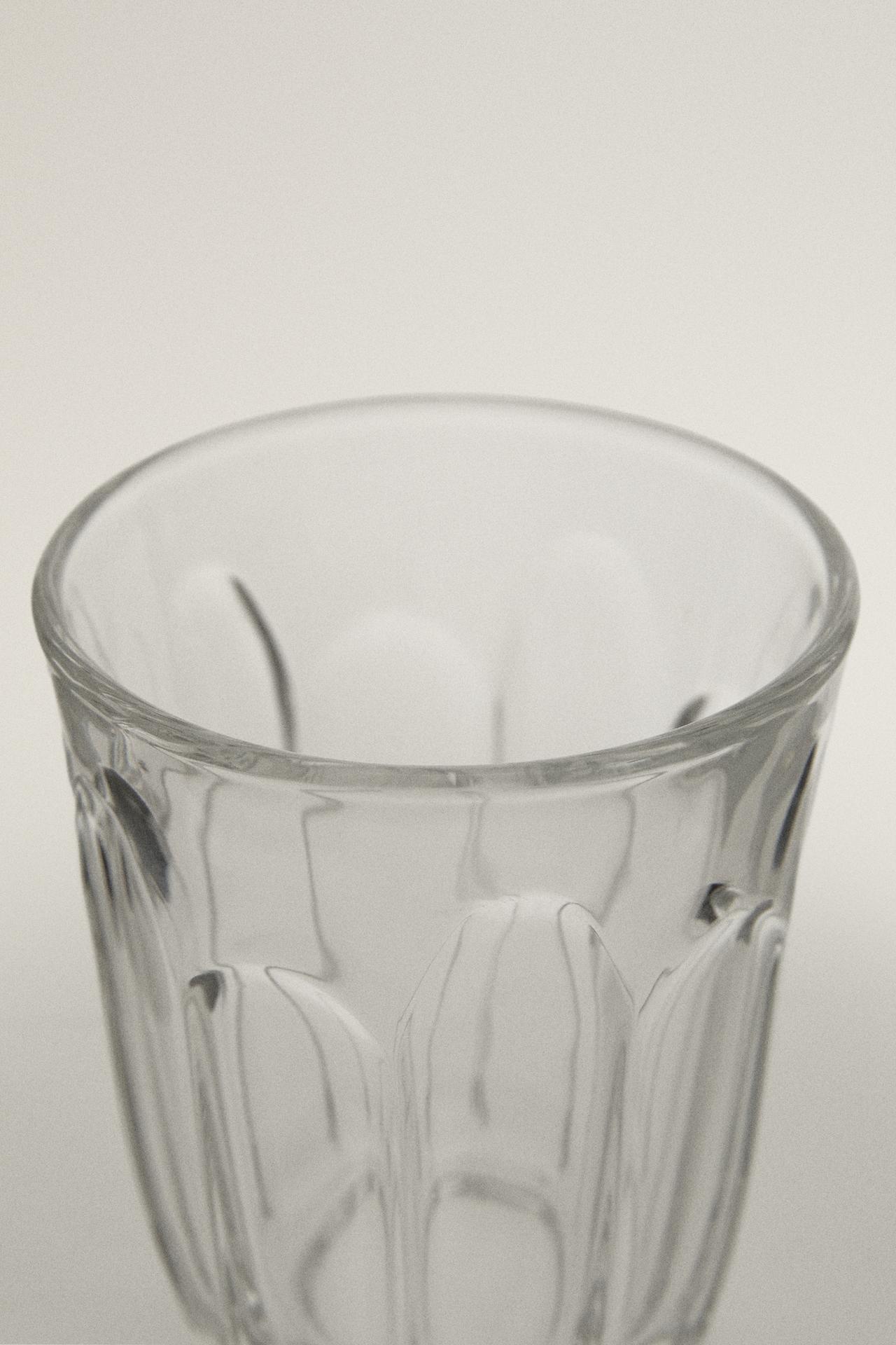 COFFEE TUMBLER WITH RAISED DESIGN — Transparent