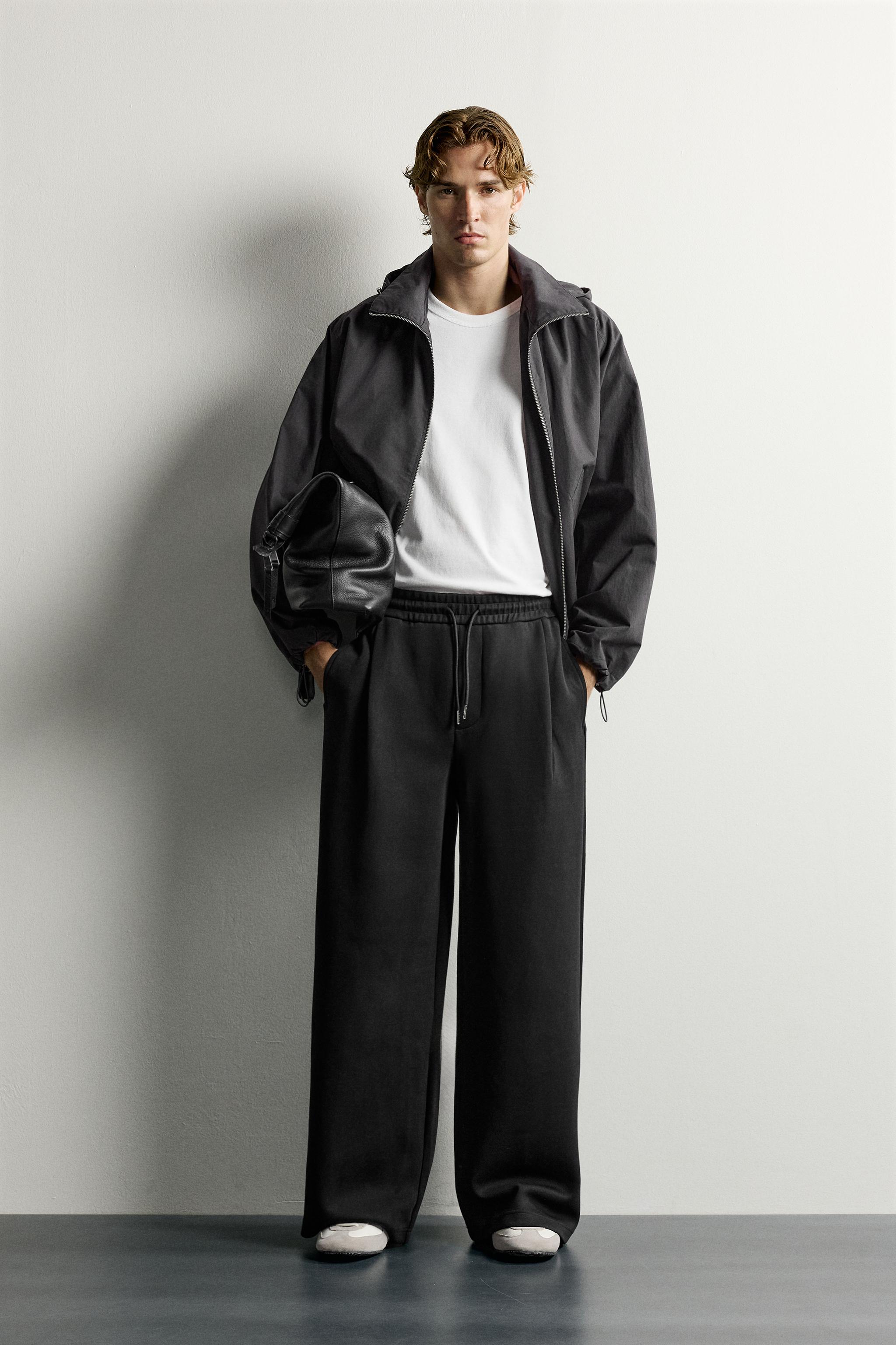 PLEATED BALLOON-FIT PANTS