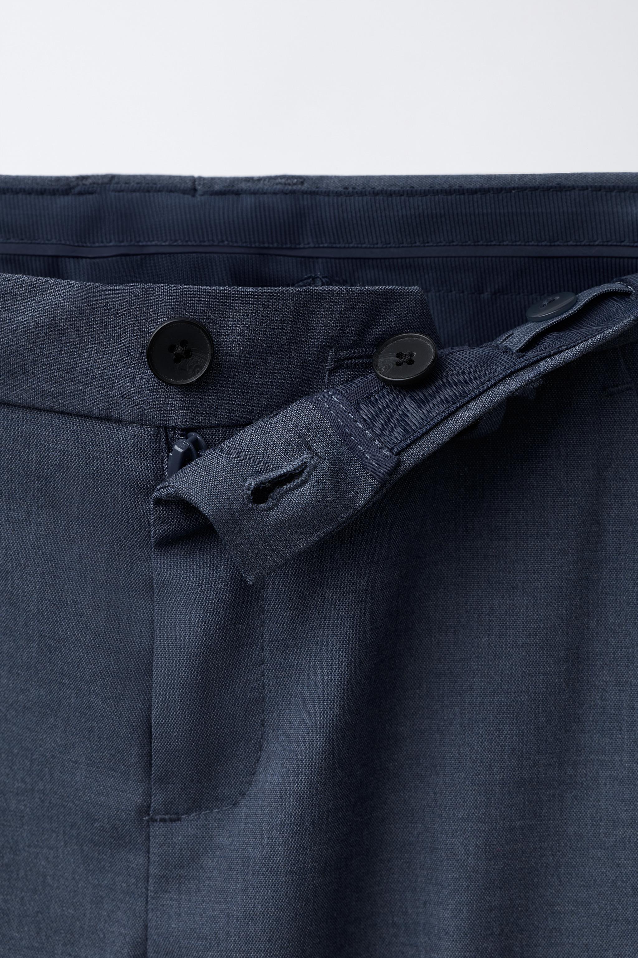 TEXTURED SUIT PANTS