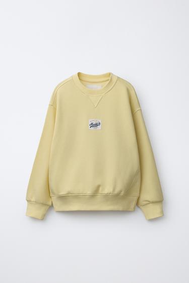 SPORTY SWEATSHIRT WITH SLOGAN - Yellow by Zara