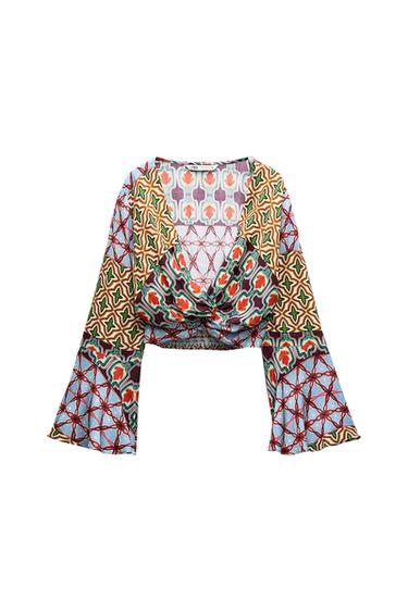 CROP TOP WITH KNOT AND FLARED SLEEVES