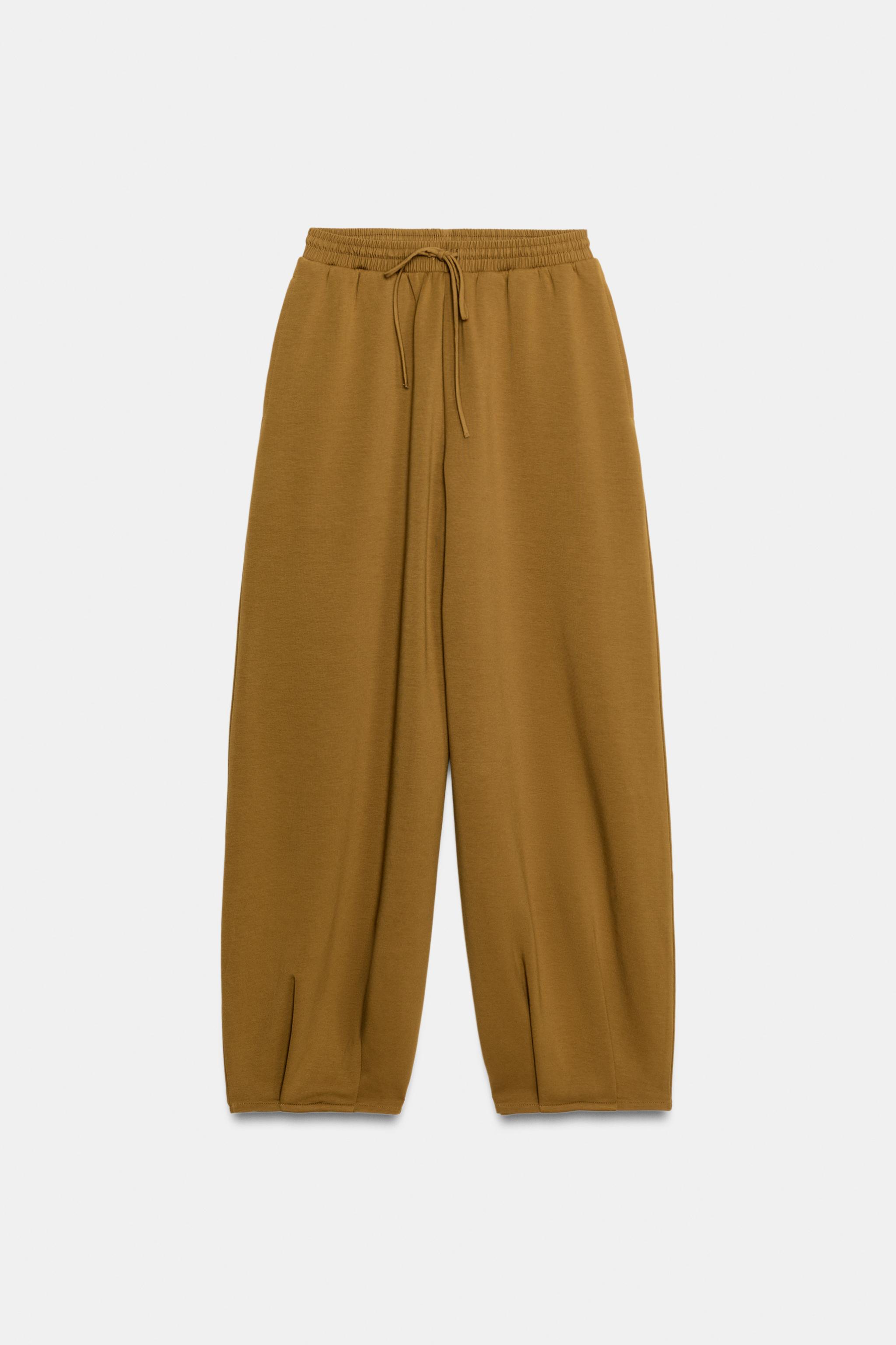 PLEATED TROUSERS