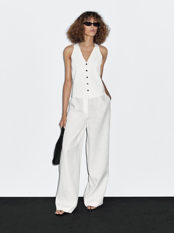 Knit waistcoat with contrast buttons