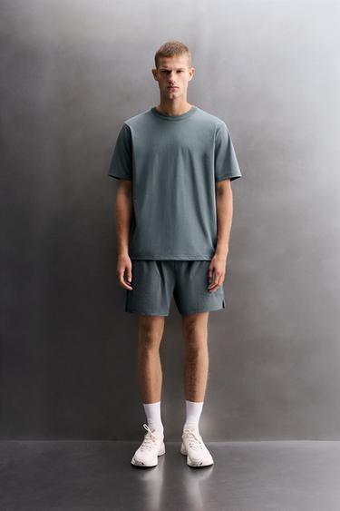 CAMISETA ALGODÓN ENTRENAMIENTO - Azul / Acero de Zara - Imagen 0