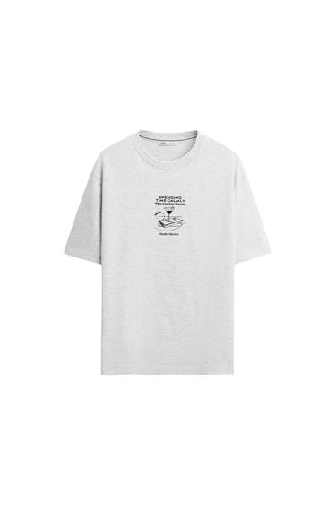 Front view of light grey t-shirt with text 'SPENDING TIME CALMLY' and swan graphic.