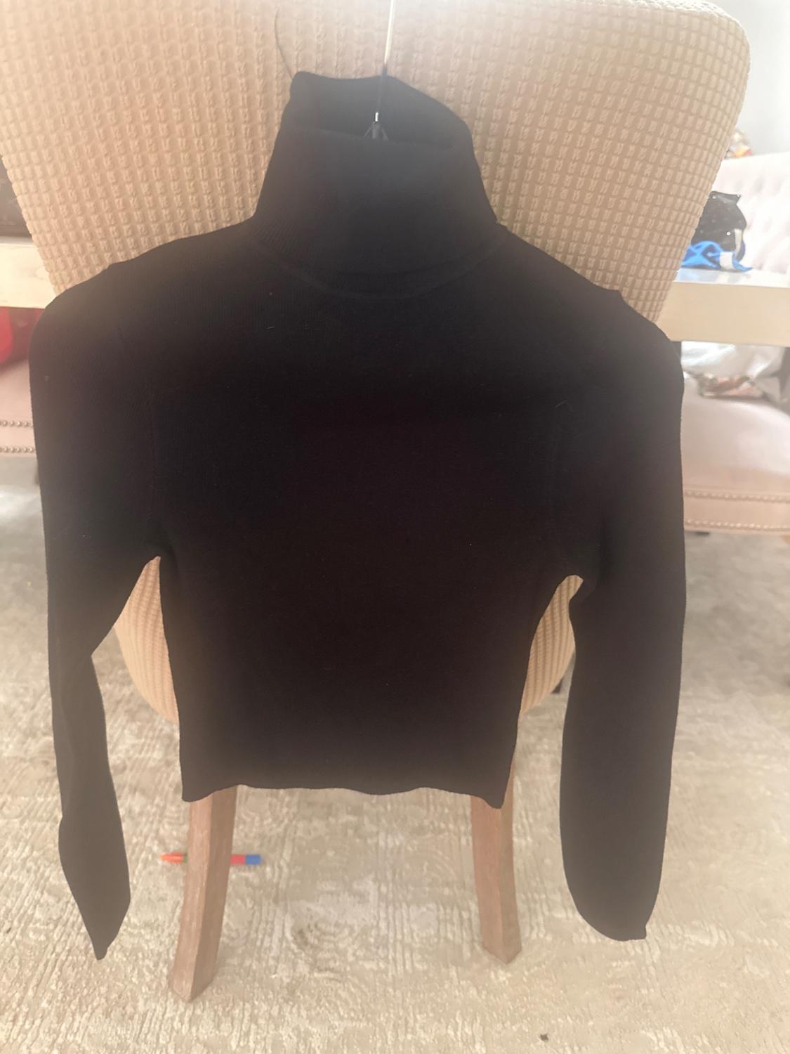 JERSEY PUNTO CROP CUELLO SUBIDO