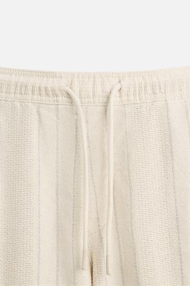 STRIPED JACQUARD TROUSERS - striped by Zara - Image 7
