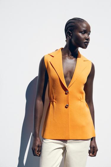 TOP GILET EN MAILLE À PLIS À LA TAILLE - Mandarine de Zara - Image 1