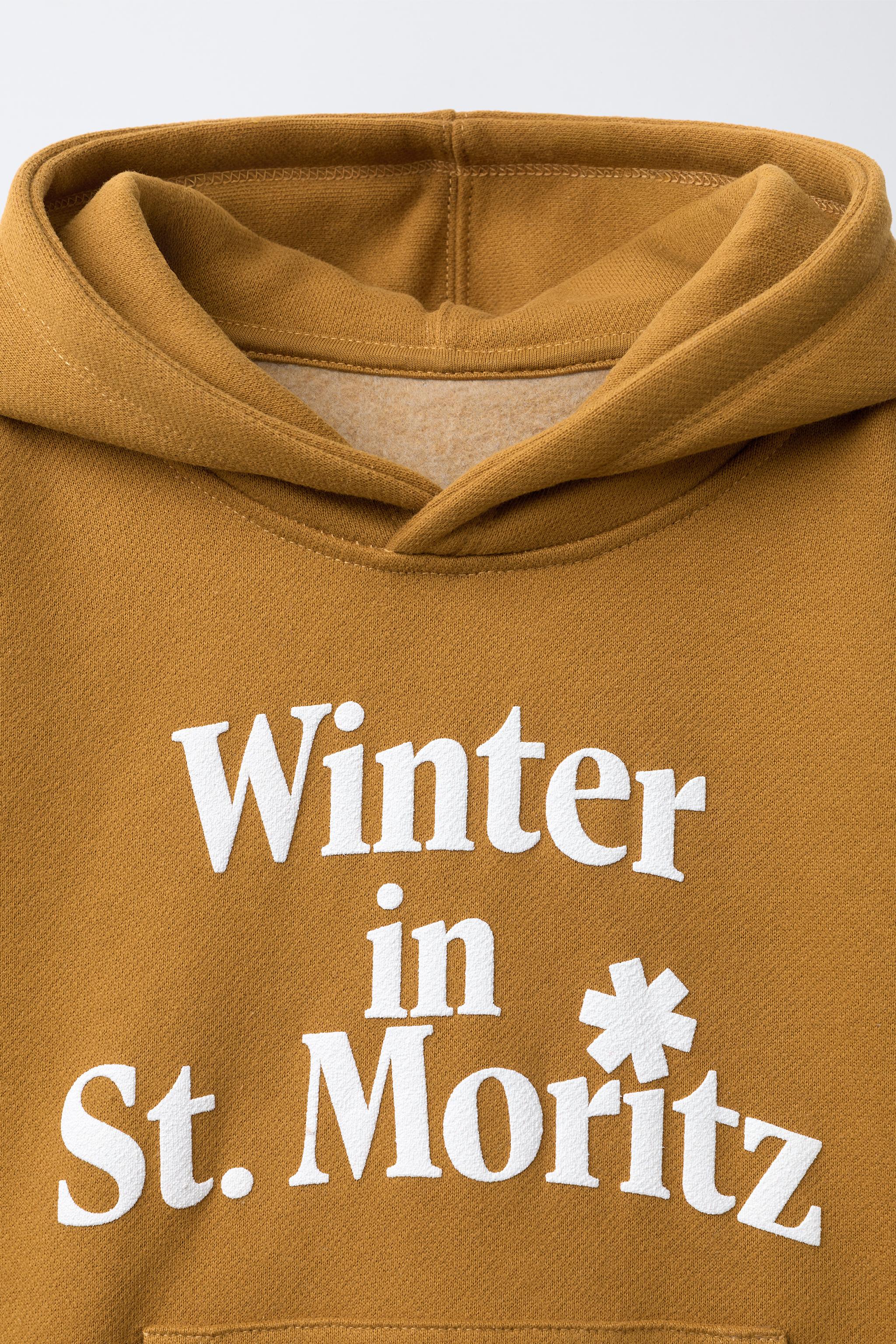 RAISED TEXT HOODIE SWEATSHIRT