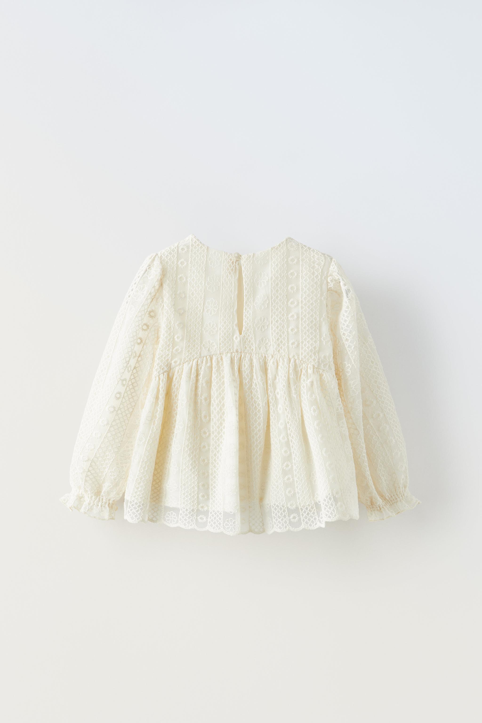 White ruffle best sale blouse zara