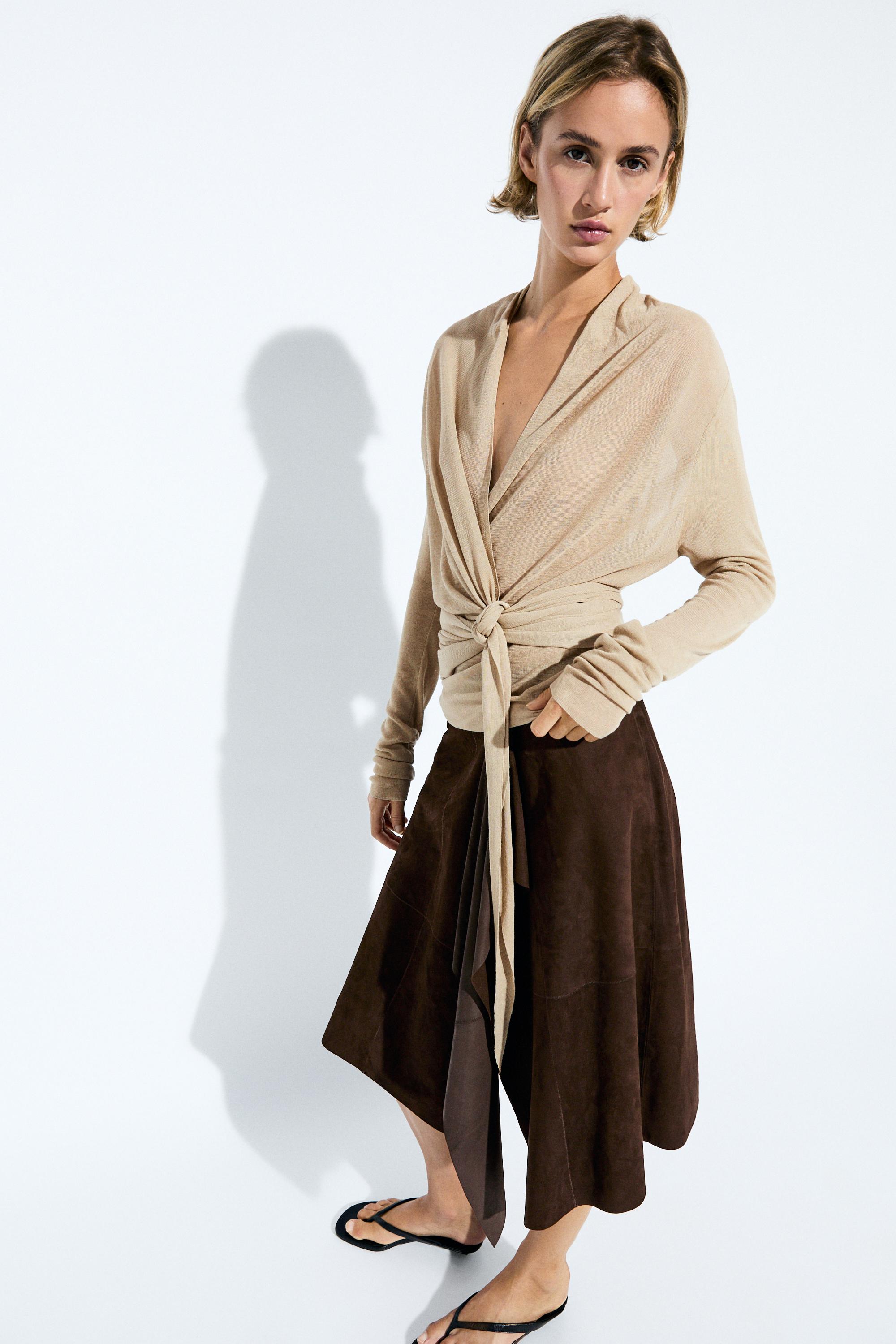 Cardigan en maille à détail drapé croisé