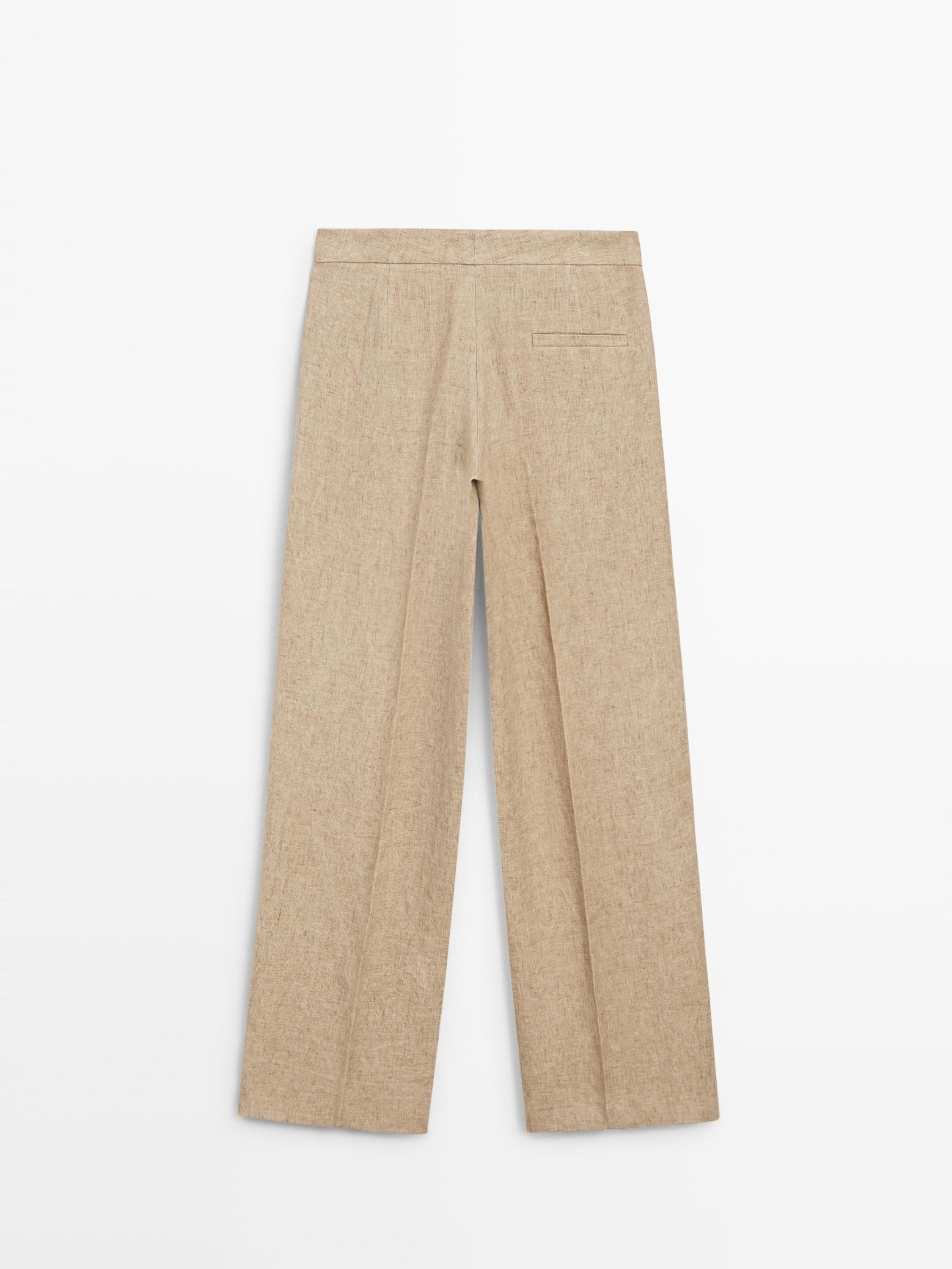 Flowing linen trousers with darts