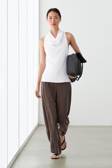 Pantalón fluido bajo botón total look - Ciruela de Zara - Imagen 0