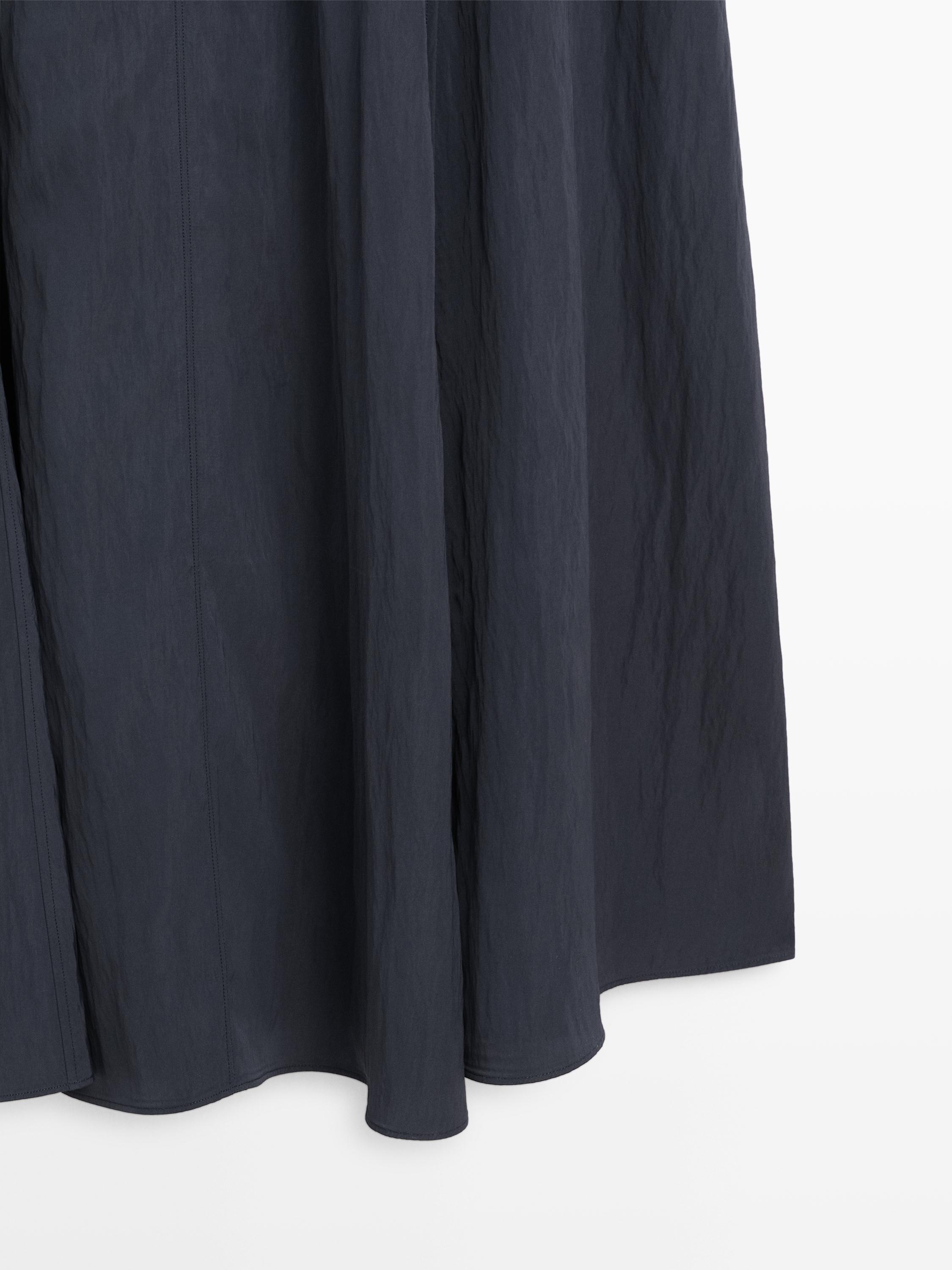 Flowing midi dress with buckles