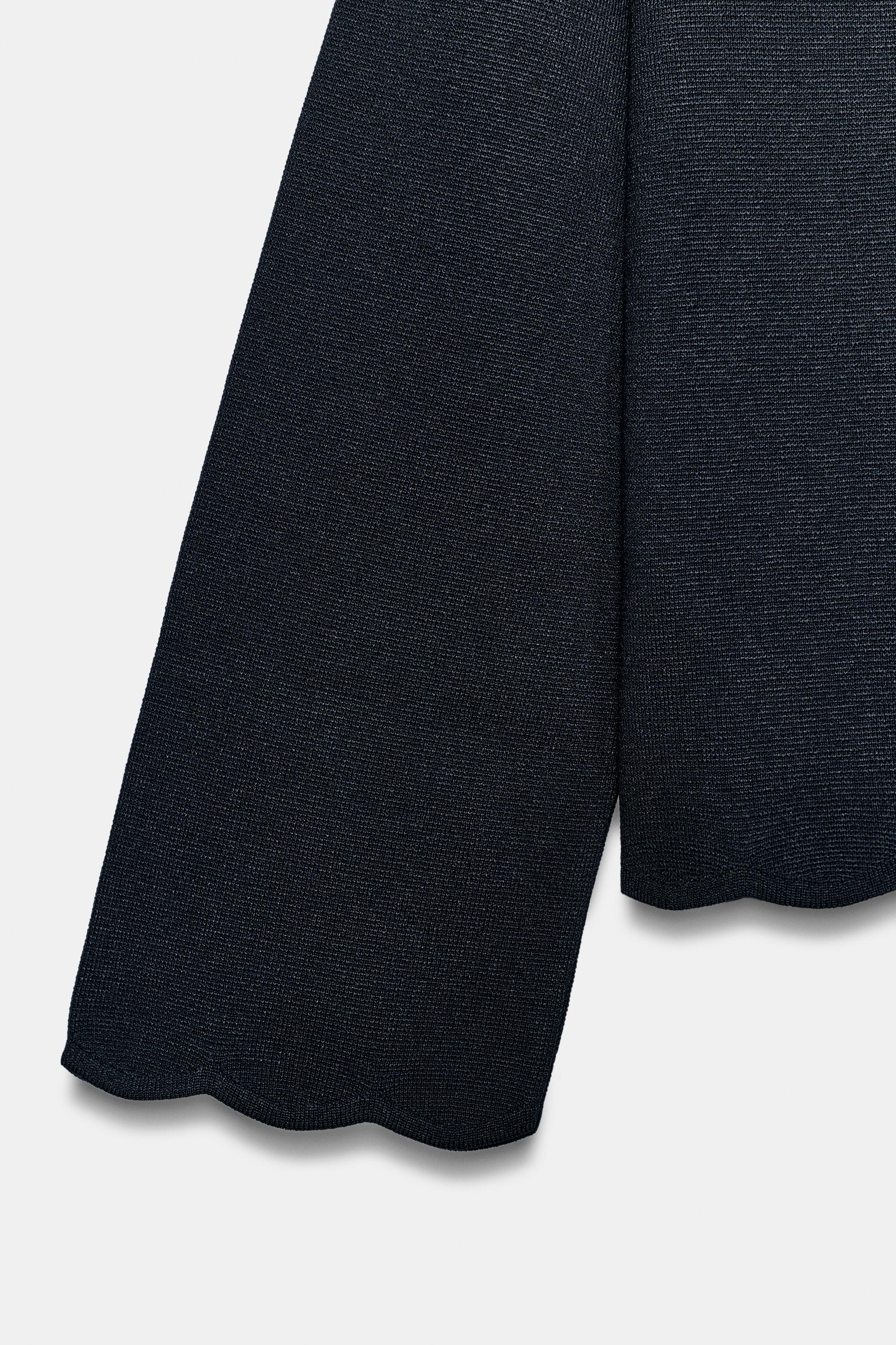GILET EN MAILLE À BAS ONDULÉ