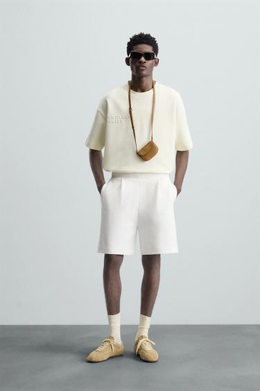 CAMISETA TEXTO GRABADO - Blanco roto de Zara - Imagen 0
