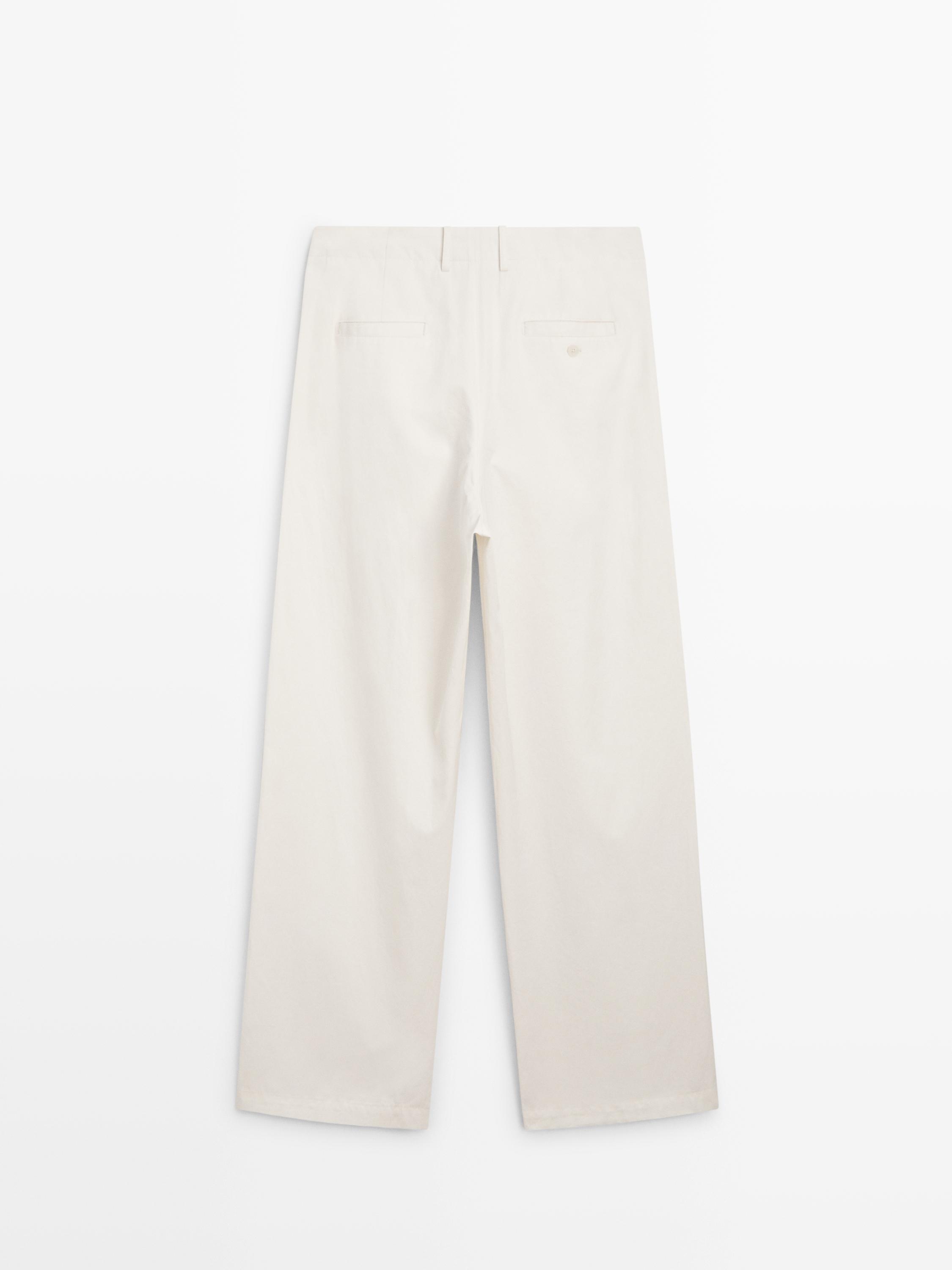 Pleated trousers with crossover fastening - STUDIO