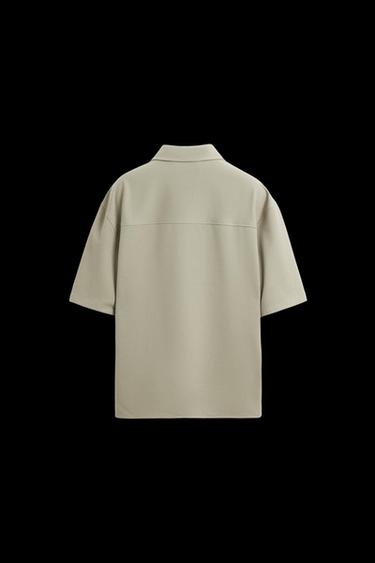 POLO TÉCNICO CREMALLERA - Verde manzana de Zara