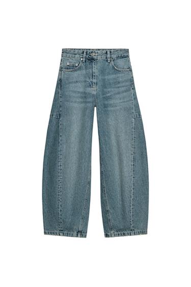Front view of blue wide-leg denim trousers with front and back pockets, button and zip fastening.